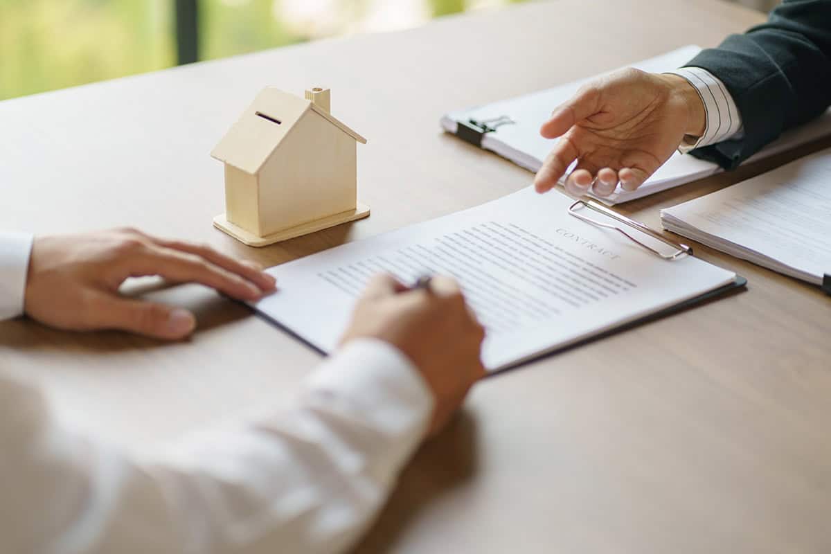 signing a legal contract on the table renter rights